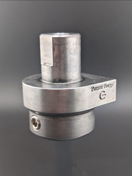 Finished specialty fly press tool holder showing its flat-sided body, recessed shank flat, and tool-retaining screw.