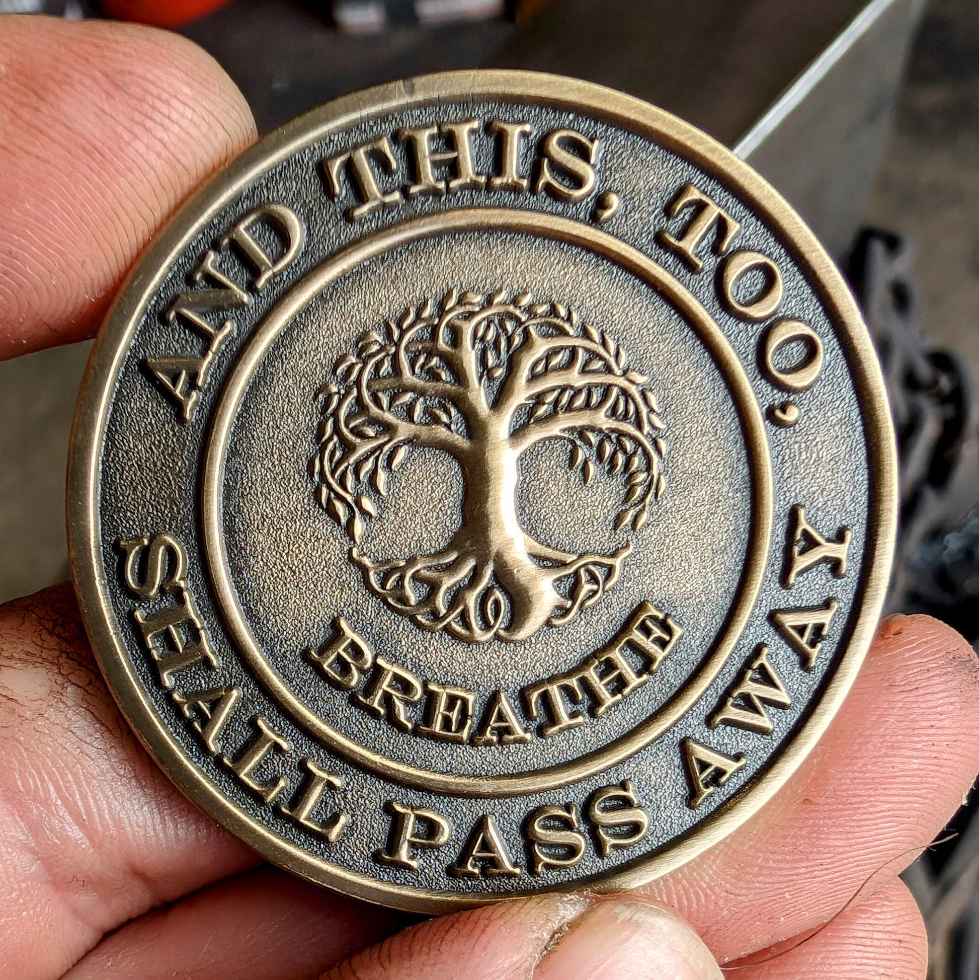 Bronze Inspirational Coin with the Phrase And This, Too, Shall Pass Away surrounding the Tree of Life and the word Breathe.