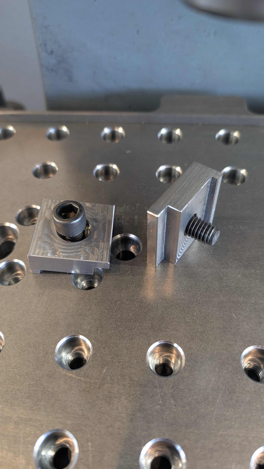 Toe clamps used to tighten down bottom tools and set ups for Blacksmith Fly Press