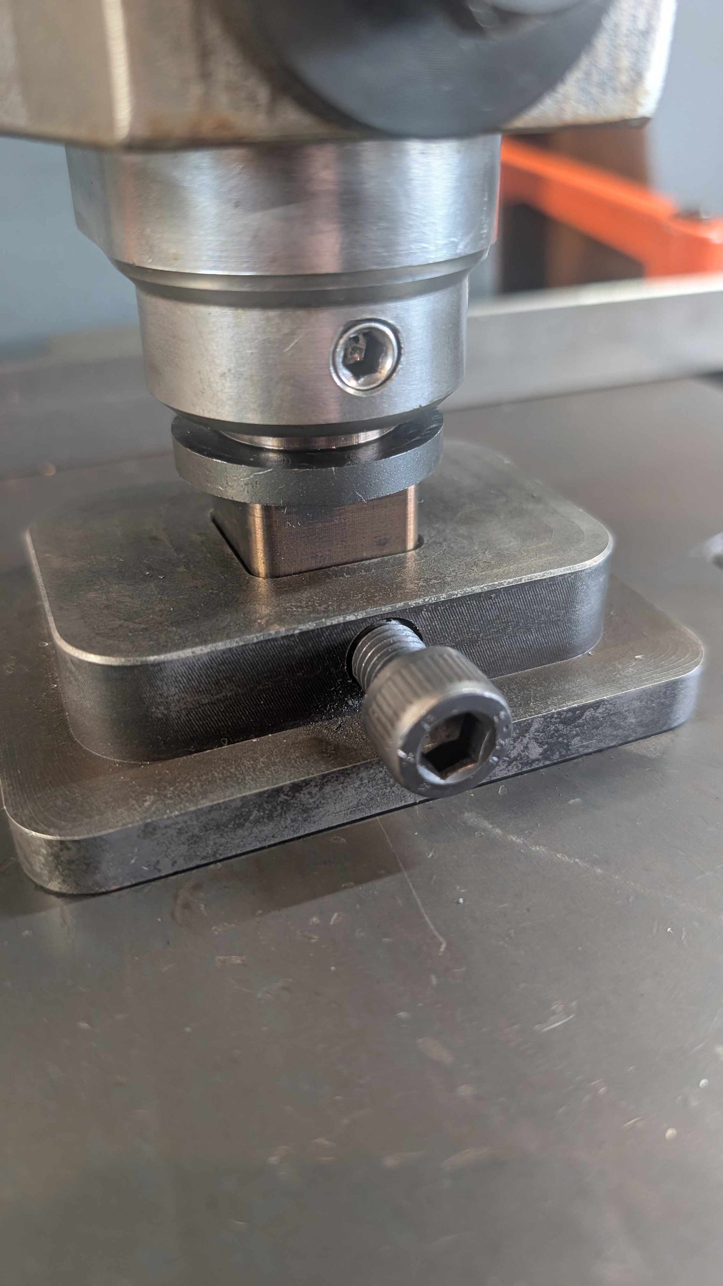 Fly Press Alignment and Indexing Tool inserted into a hardie base plate. 