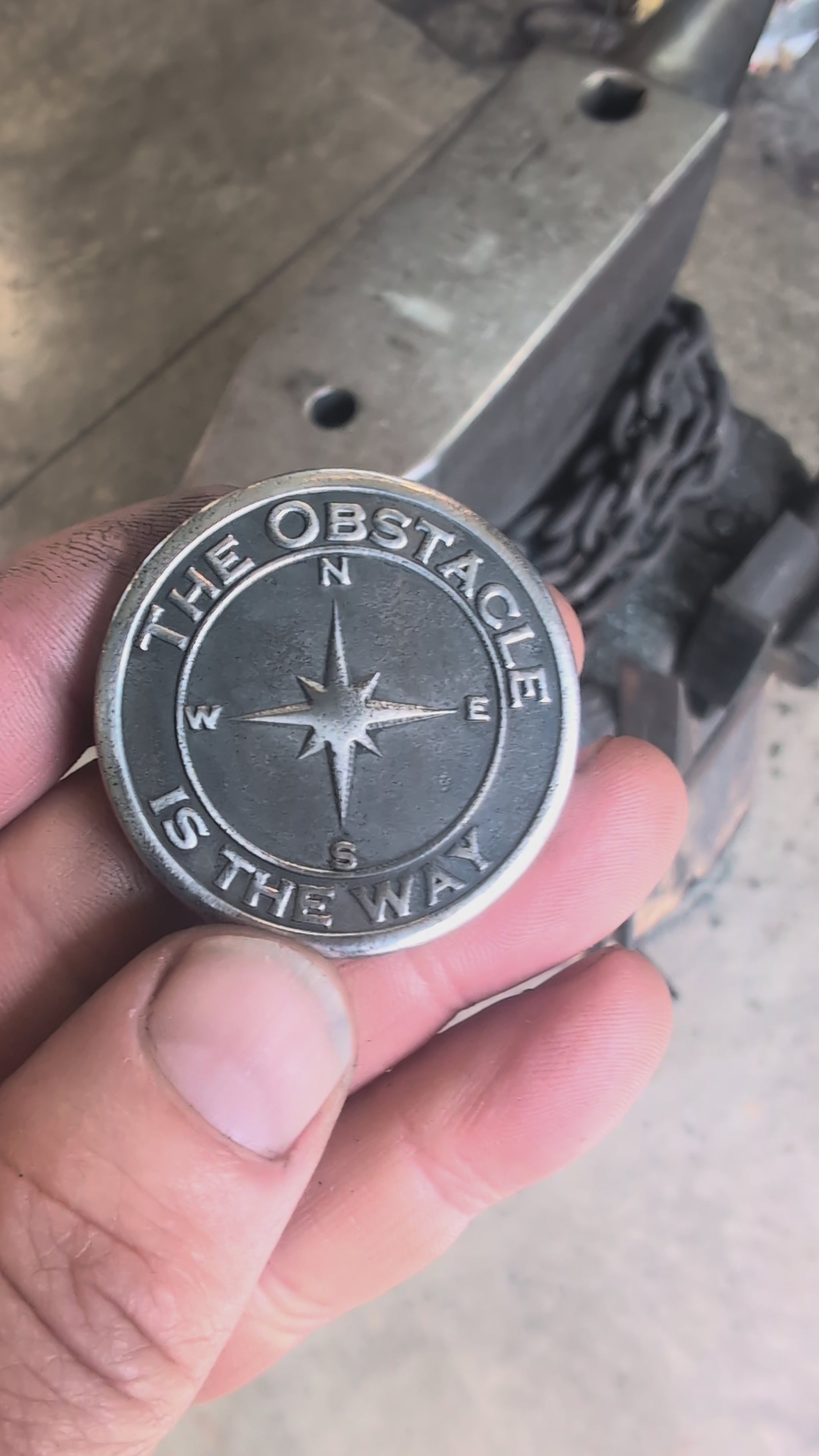 Video of Stoic Coin with the phrase The Obstacle is the Way and Embrace the suck.